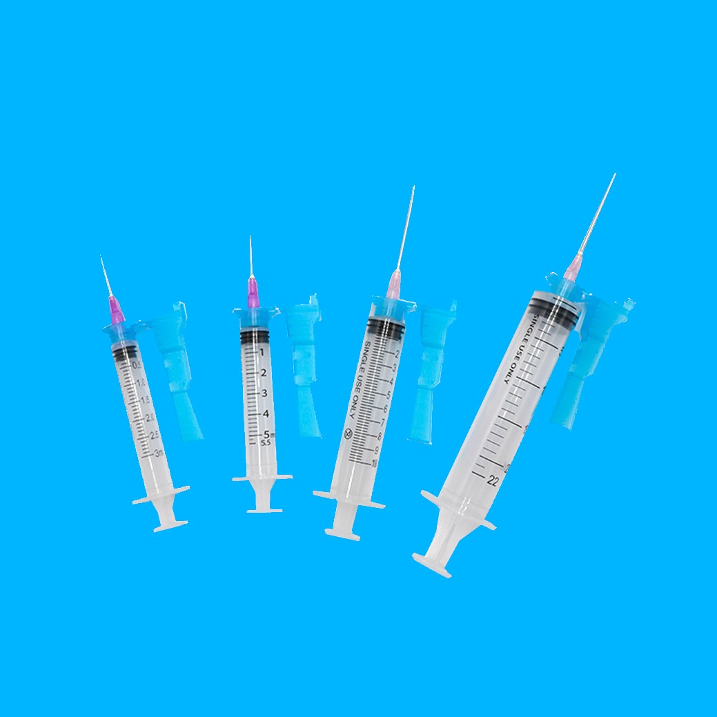 Disposable syringe with safety cap
