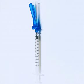 Disposable syringe with safety needle